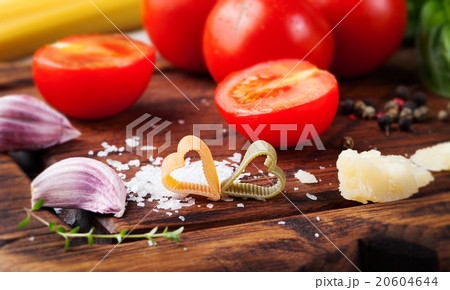 Italian food background Ingredients on stone table Italian food background Ingredients on stone table 20604644