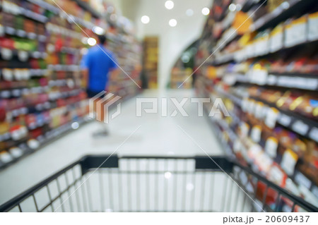 Abstract blurred photo of store with trolley in department store Abstract blurred photo of store with trolley in department store 20609437