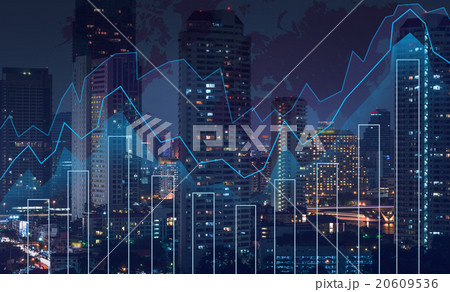 Trading graph on the cityscape at night and world map background 20609536