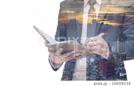 Double exposure of businessman with cityscape 20609538