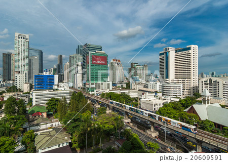 BANGKOK, THAILAND - AUG 6 : Sky train running and traffic jam wi 20609591