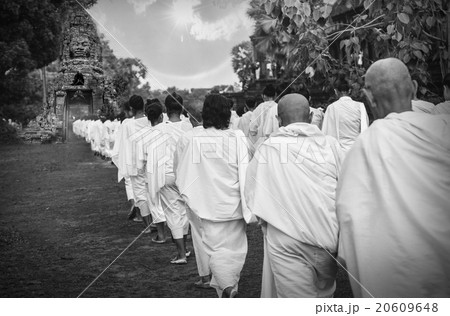 Many unidentified Buddhist nuns in white suit walking for celebr Many unidentified Buddhist nuns in white suit walking for celebr 20609648