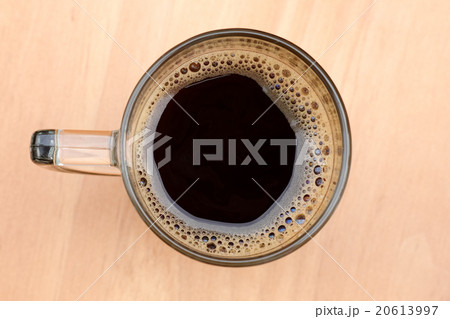 Top view of an cup of coffee with some bubbles. Top view of an cup of coffee with some bubbles. 20613997