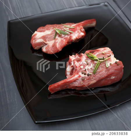 fresh lamb on a black plate 20633838