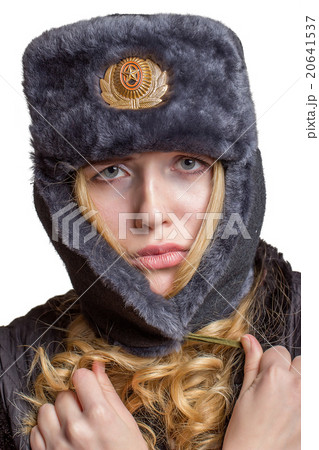 Beautiful girl wearing a soviet soldier's cap 20641537