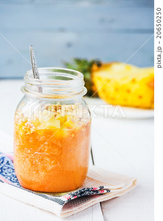 smoothie with tropical fruits, pineapple and peach 20650250
