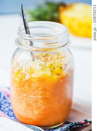 smoothie with tropical fruits, pineapple and peach 20650251
