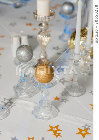 Festive table decorated with candles 20650259