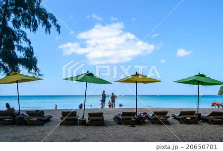 Beach chair and the colorful umbrella on the beach Beach chair and the colorful umbrella on the beach 20650701