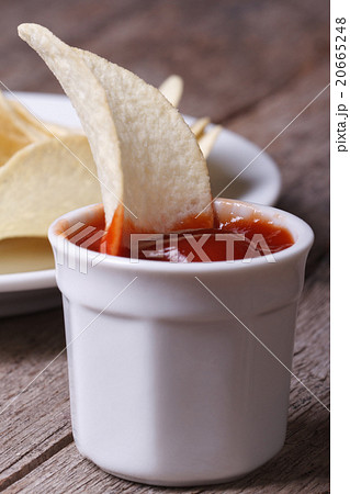 Potato chips with ketchup macro for close up 20665248