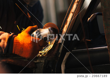 Craftsman repair a car with angle grinder 20667189