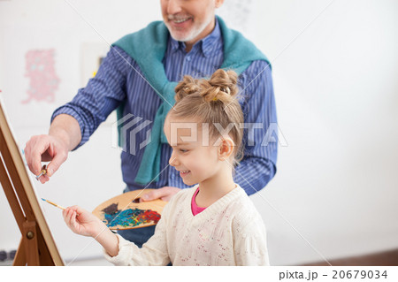 Pretty artistic family is painting together 20679034