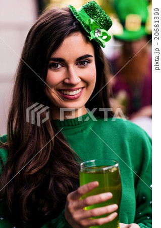 Portrait of woman celebrating St Patricks day 20681399