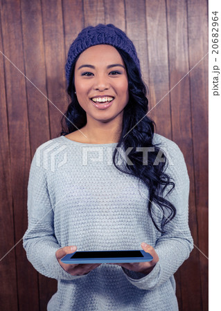 Asian woman holding tablet Asian woman holding tablet 20682964