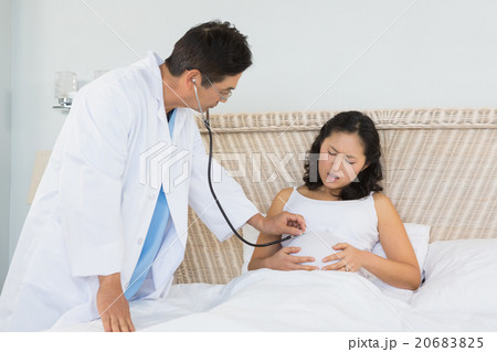 Doctor visiting pregnant woman Doctor visiting pregnant woman 20683825