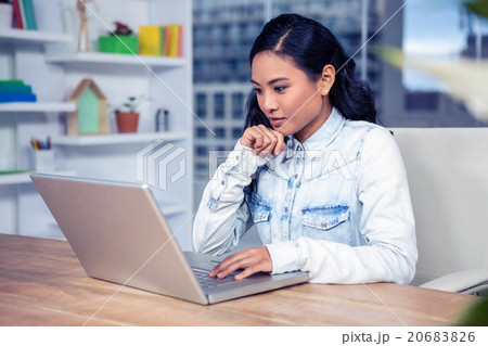 Asian woman using laptop 20683826