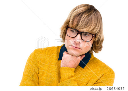 Portrait of thoughtful hipster businessman with hand on chin 20684035