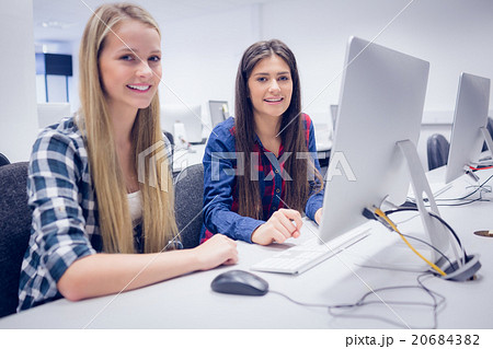 Students working on computer Students working on computer 20684382