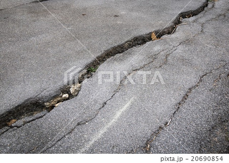 Cracked asphalt road  20690854