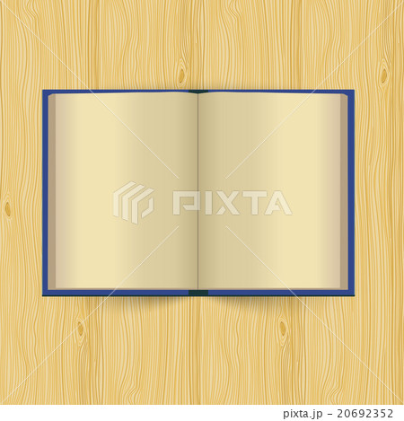 Opened book with yellow pages on wooden background 20692352