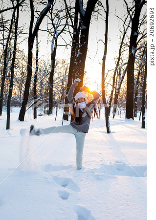attractive young woman (Girl) playing with snow 20692693