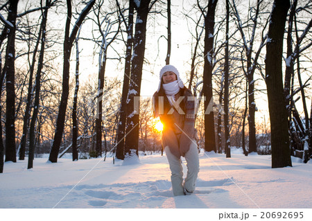 attractive young woman (Girl) playing with snow 20692695