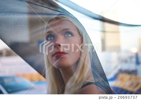 young woman with black veil 20693737