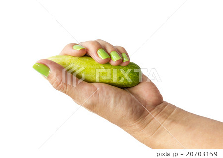 Hand holding cucumber Hand holding cucumber 20703159