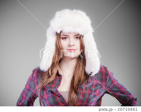 Young woman in winter clothing fur cap Young woman in winter clothing fur cap 20710881