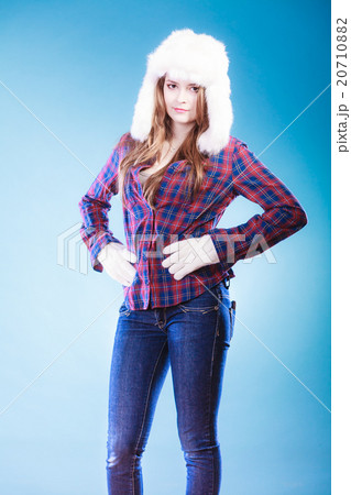 Young woman in winter clothing fur cap Young woman in winter clothing fur cap 20710882