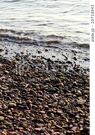 Sea pebble, gravel beach, selective focus. 20718943