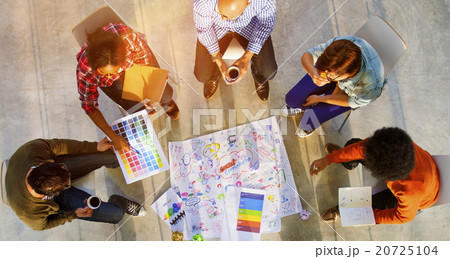 Design Team Planning on a Project with Color Swatches Concept Design Team Planning on a Project with Color Swatches Concept 20725104
