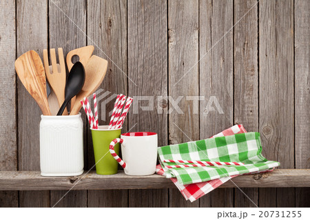 Kitchen utensils on shelf 20731255