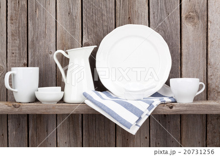 Kitchen utensils on shelf Kitchen utensils on shelf 20731256