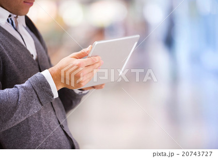 Detail of tablet in hand Detail of tablet in hand 20743727
