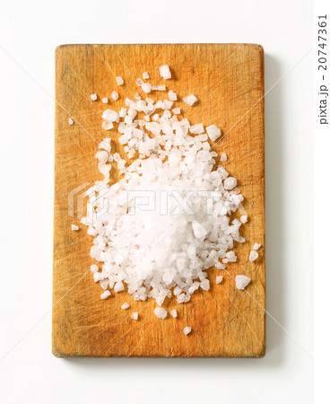 Coarse sea salt on cutting board 20747361