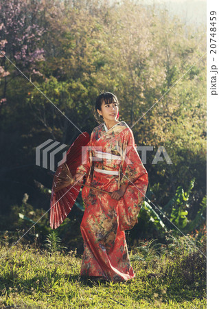 Kimono women standing outdoor 20748459