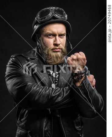 Angry Bearded Biker Man in Leather Jacket Angry Bearded Biker Man in Leather Jacket 20749468