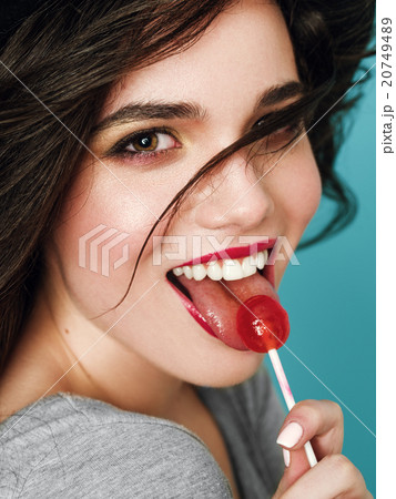 Beautiful amazing sexy smiling woman with lollipop 20749489