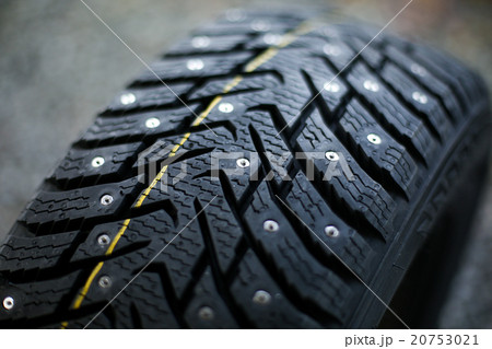 New studded tire on  background 20753021