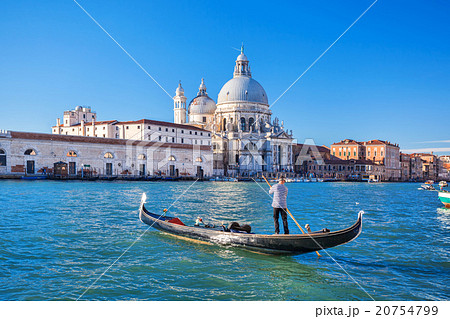 Gondolier on Grand canal in Venice, Italy Gondolier on Grand canal in Venice, Italy 20754799