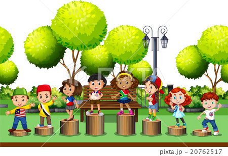 Children standing on log in the park Children standing on log in the park 20762517