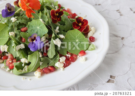 Rocket feta cheese salad with pomegranate seeds 20763321