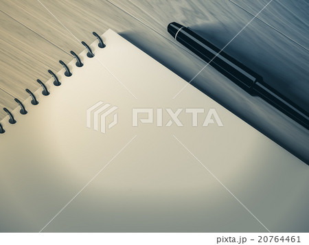 Blank note paper with pen. on wood background Blank note paper with pen. on wood background 20764461