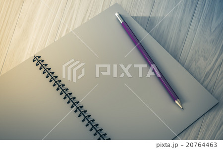 pencil on checked notebook on wood background pencil on checked notebook on wood background 20764463