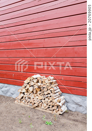 Firewood pile stored outside 20769905