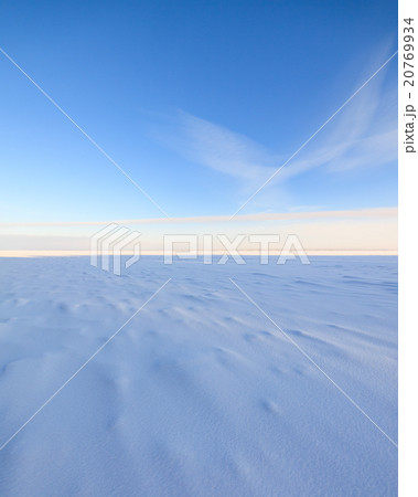 Frozen lake scape and blue sky 20769934