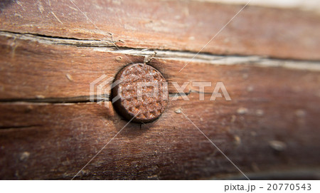 old rusty nail in wood 20770543