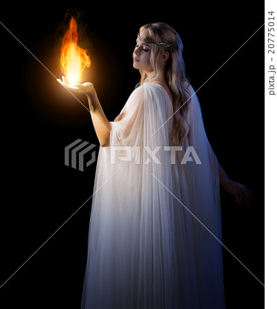 Young elven girl holding fire in palms 20775014