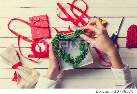 Female hands are holding gift 20776070